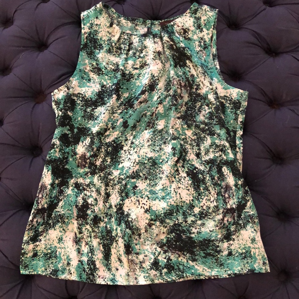 Limited silky, sleeveless work blouse